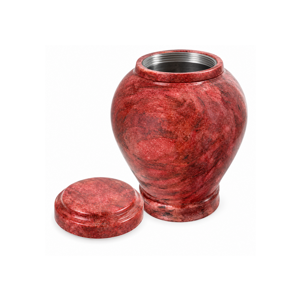 Rød marmorurne til aske med naturlige stenårer og elegant, poleret finish.\
Smuk kremeringsurne fremstillet af naturlig marmorsten.\
Elegant begravelsesurne til opbevaring af aske efter kremering.\
Klassisk mindeurne med afrundet form og matchende låg.\
Marmorurne med sort filtbund, der beskytter underlaget mod ridser.